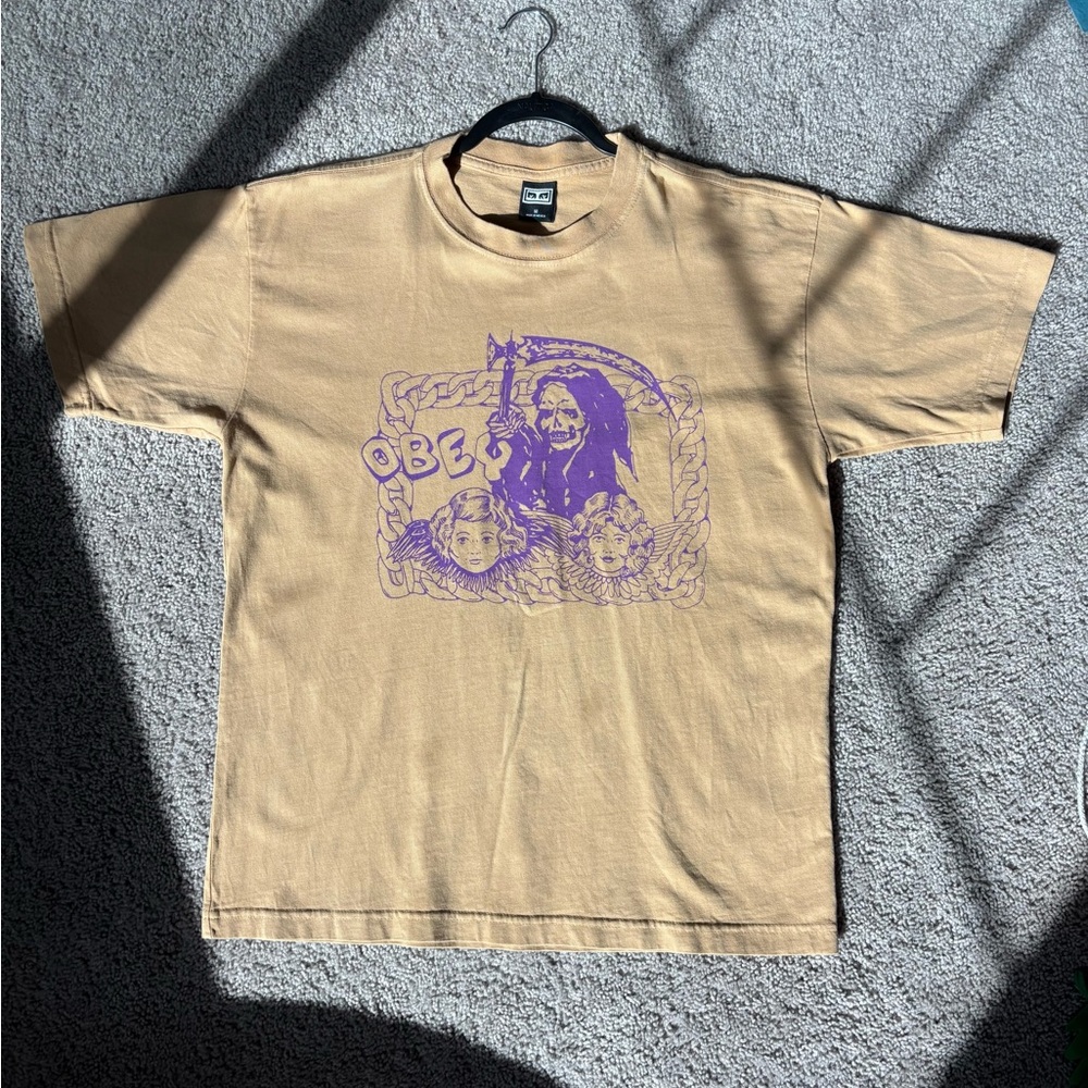 Tan Graphic T-Shirt with Purple Design